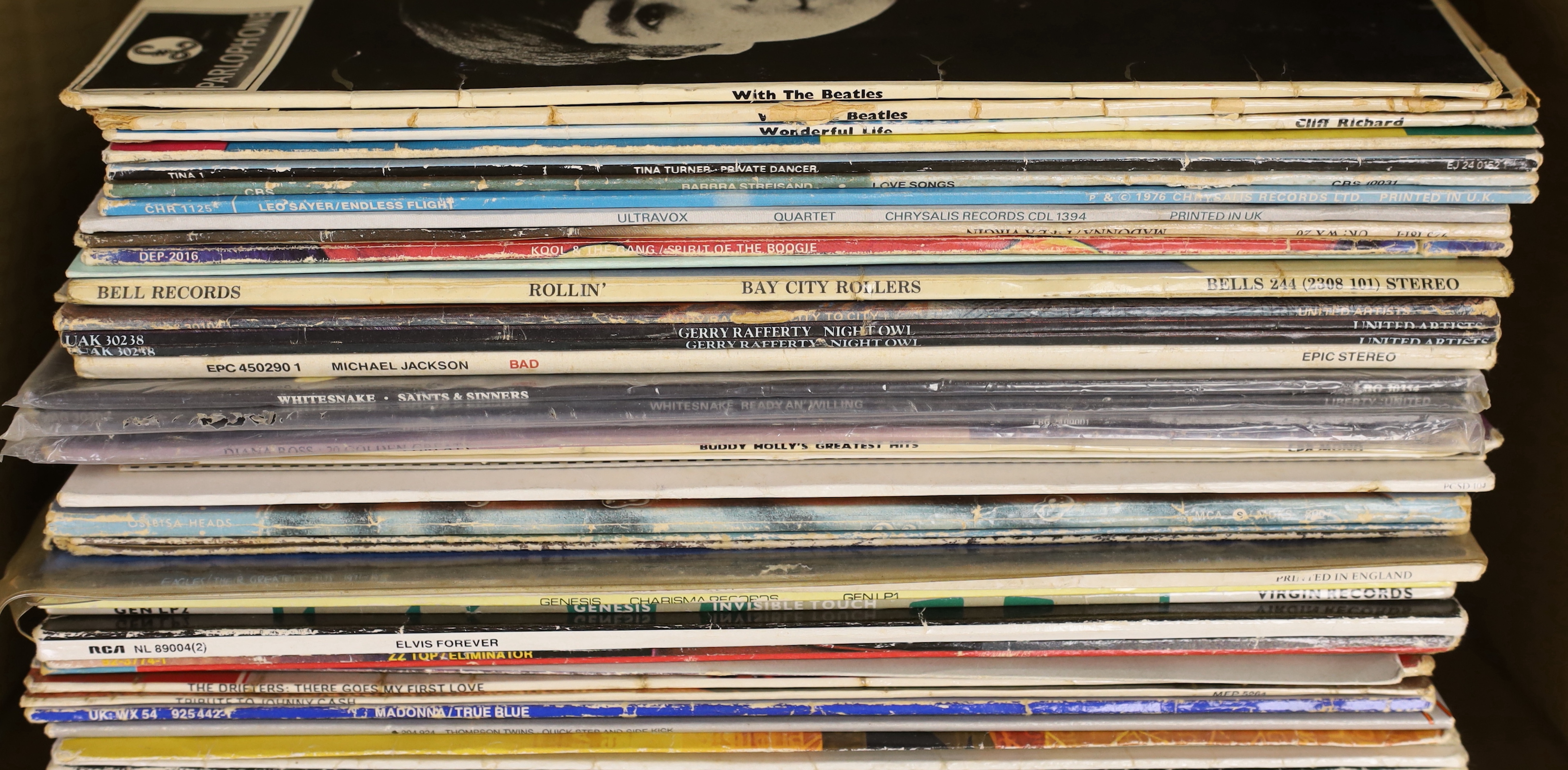 A collection of LP record albums and 12” singles (approx 50), artists include; the Beatles, Cliff Richard, Barbra Streisand, Michael Jackson, Whitesnake, Sting, Madonna, Def Leppard, Tina Turner, Leo Sayer, Ultravox, etc